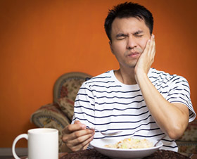 man with tooth pain