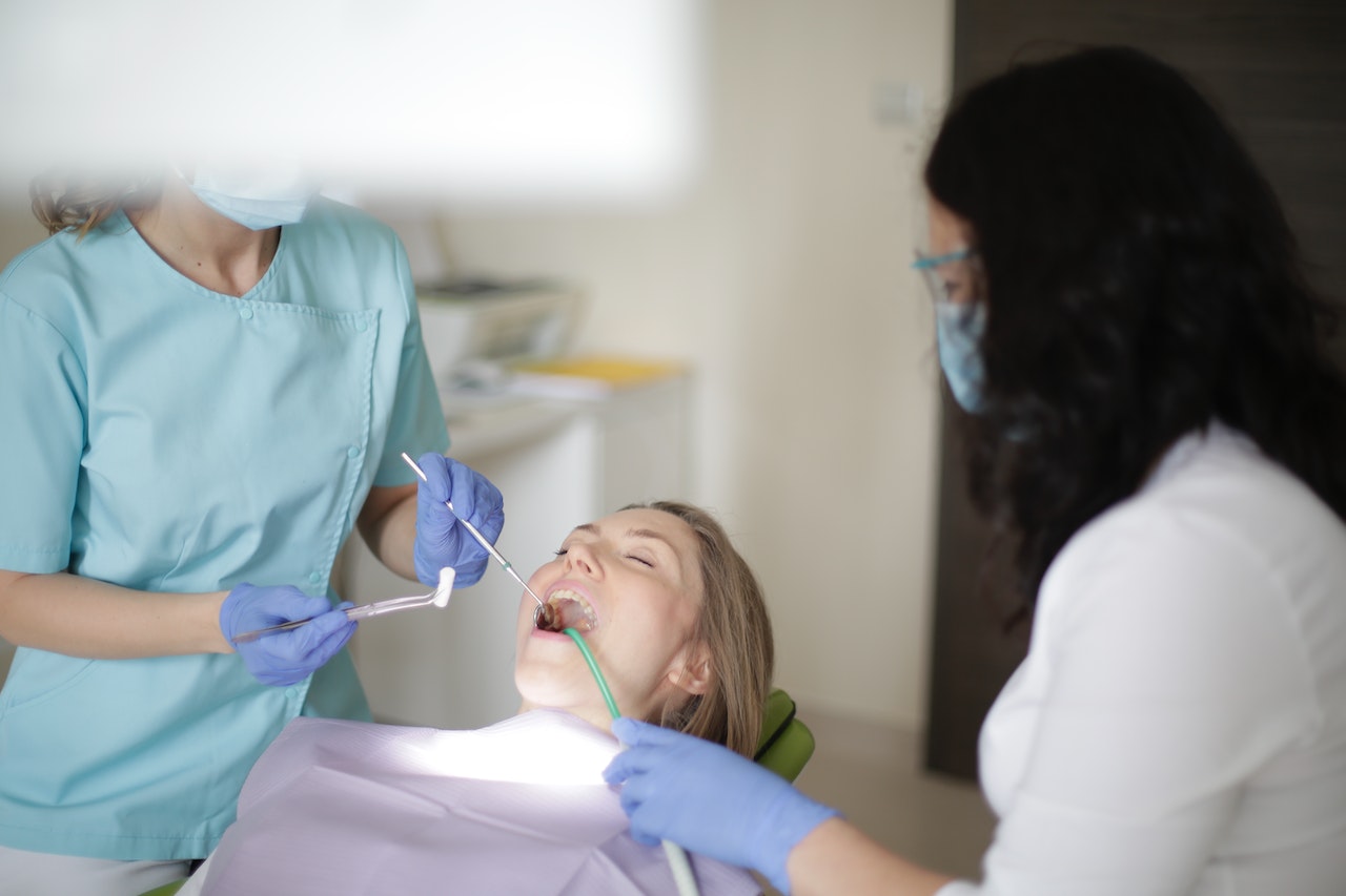 A dentist treating a patient