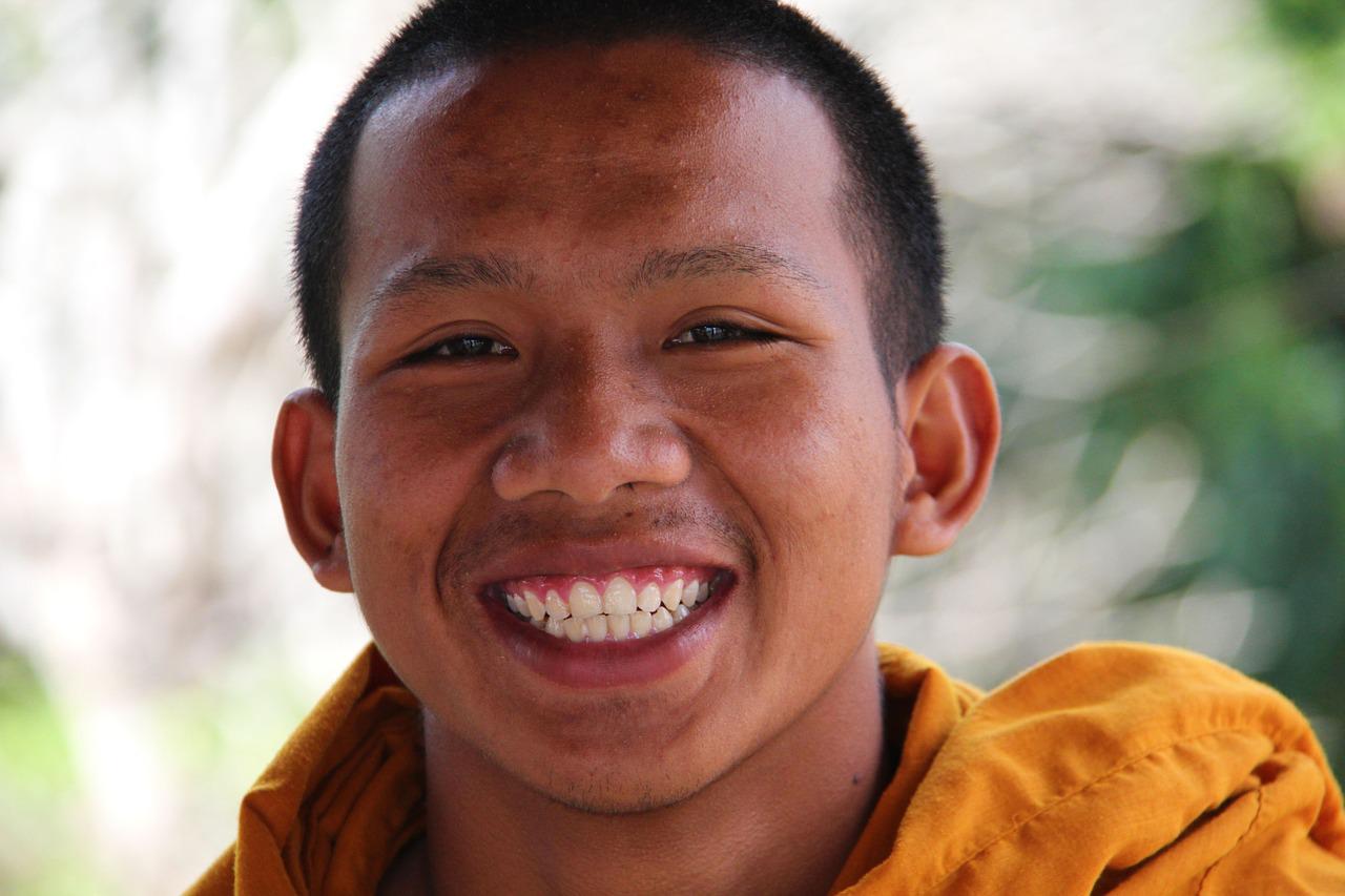 A man smiling after teeth whitening