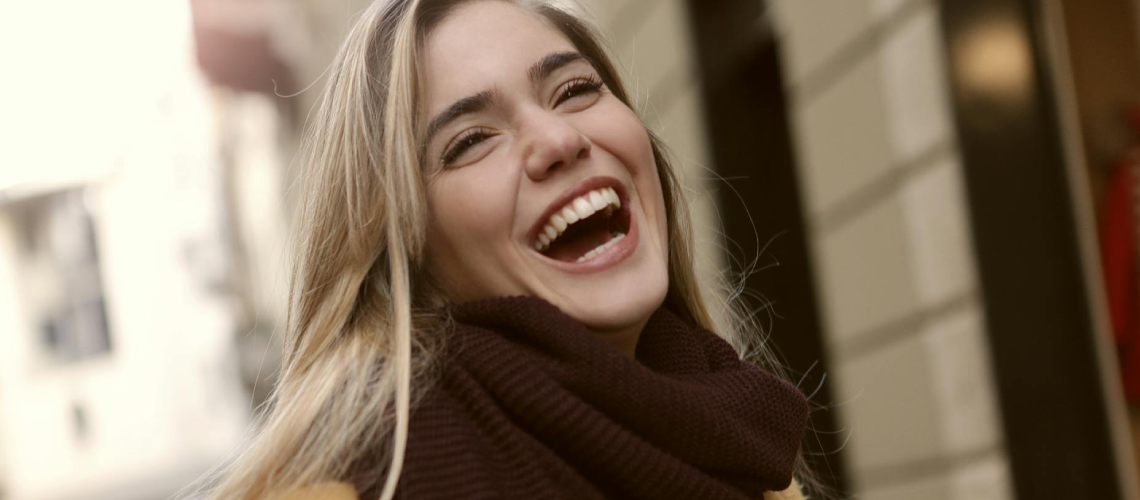 A smiling young woman.