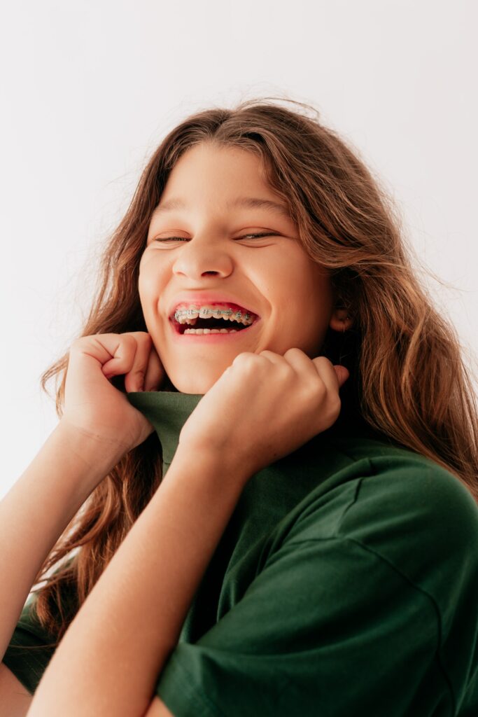 Girl with braces smiling