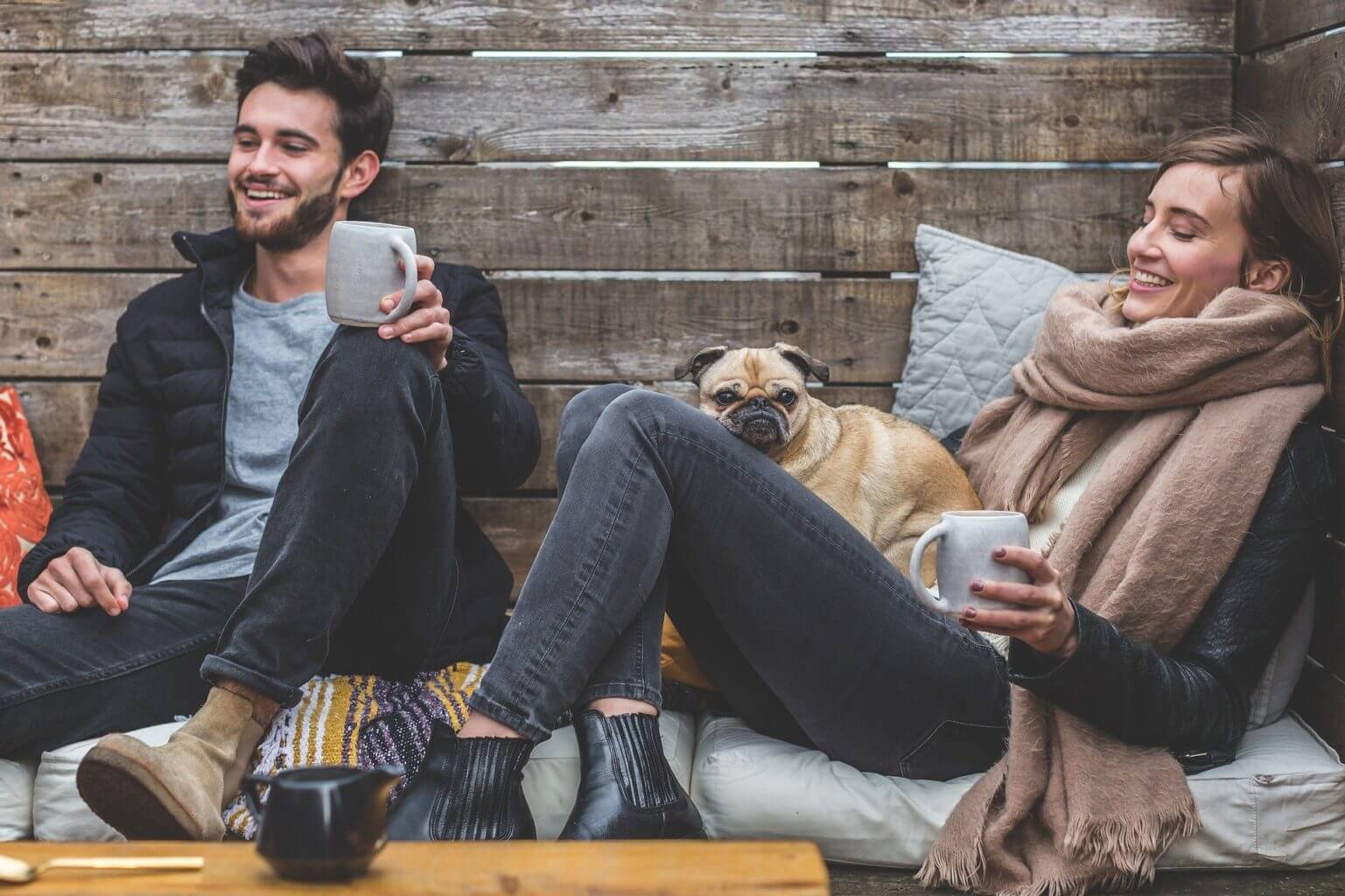 man woman with coffee cups