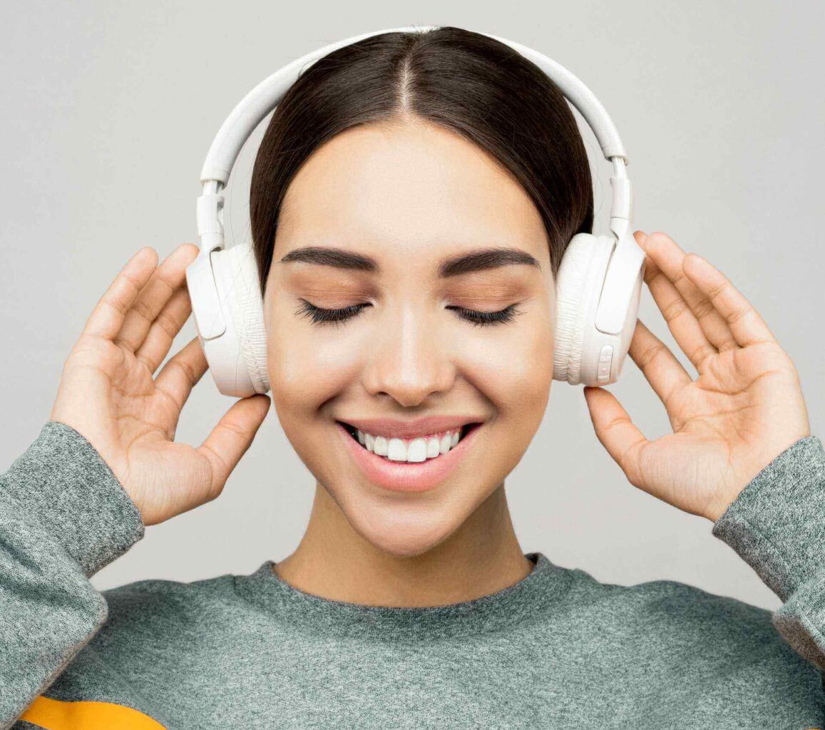 woman smiling with headphones