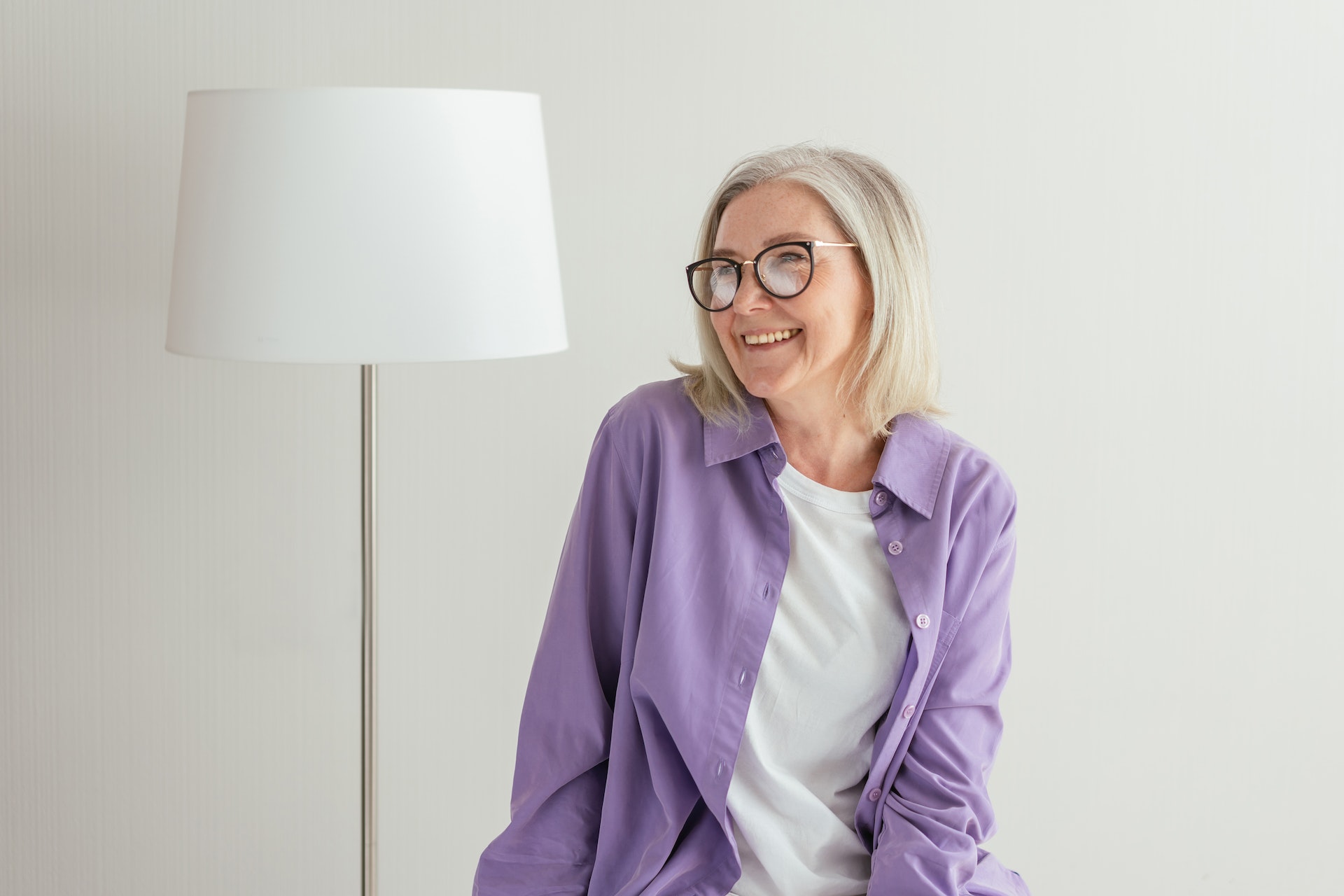 An older woman smiling brightly