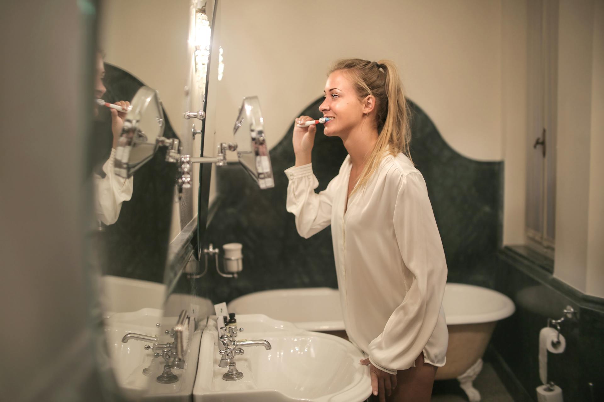 Woman brushing her teeth