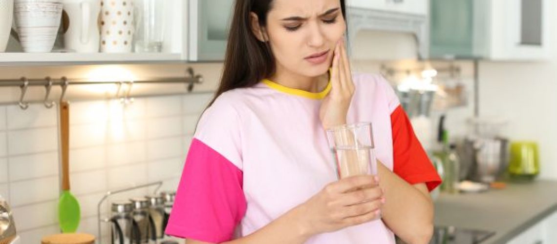 woman with tooth pain